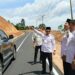 Jalan Batang Asai Mulus di Era Gubernur Al Haris, Warga Gelar Syukuran