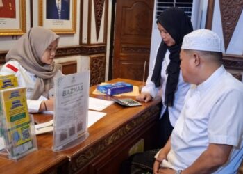 Kadis PUTR Jambi Muzakir Salurkan Zakat Fitrah 1447 H, Baznas RI Apresiasi Komitmen OPD Pemprov